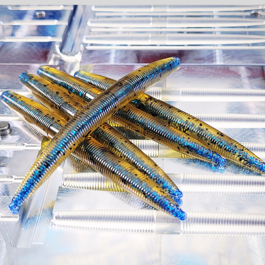 Angling A.i. Core Shot stick bait mold with laminated two-tone baits