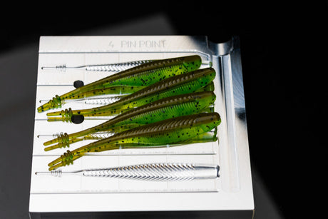 Angling A.i. 4 inch Pin Point aluminum mold with poured soft plastic swimbait trailers